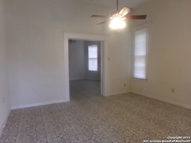 empty room featuring ceiling fan