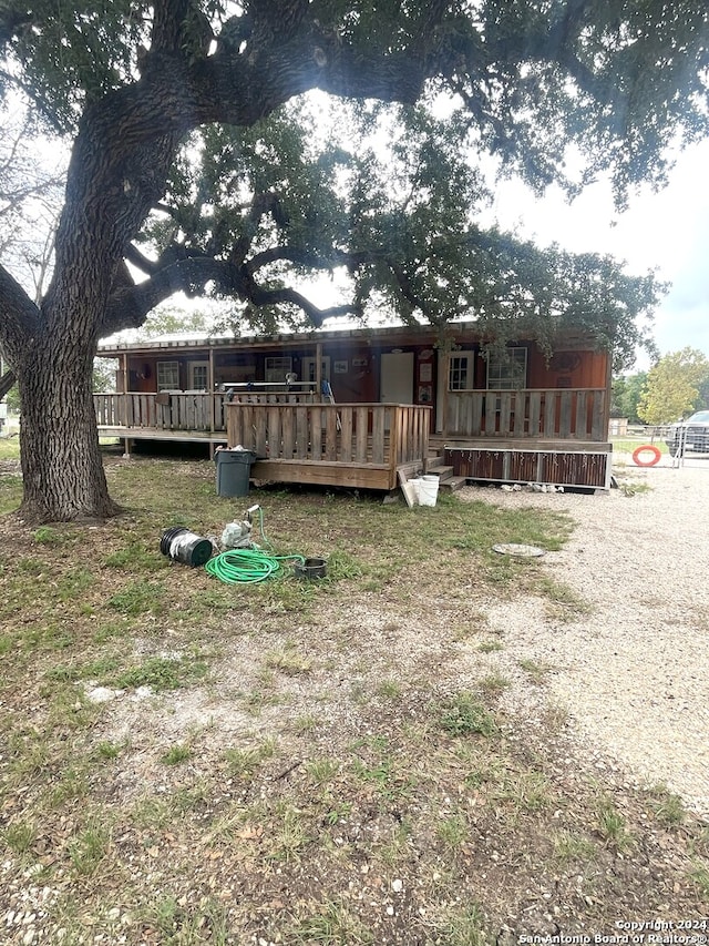 exterior space featuring a deck