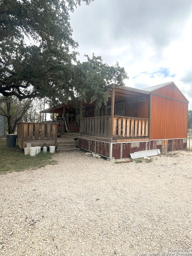 exterior space with a wooden deck