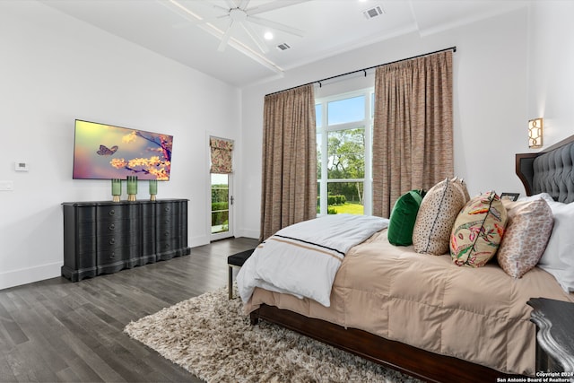 bedroom featuring ornamental molding, dark hardwood / wood-style floors, ceiling fan, and access to exterior