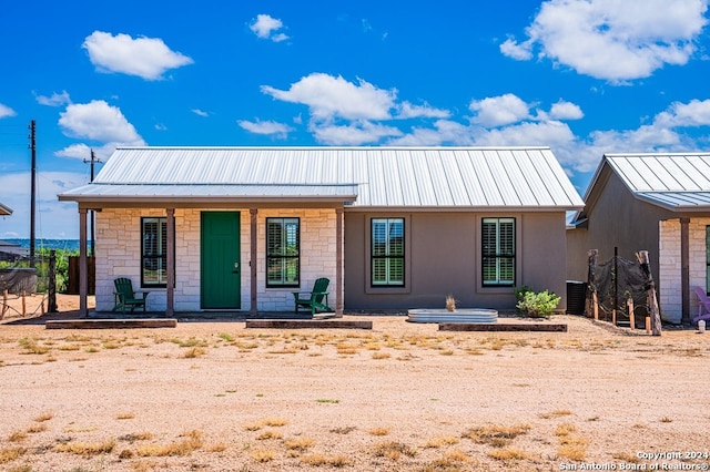 view of front of home featuring central air condition unit