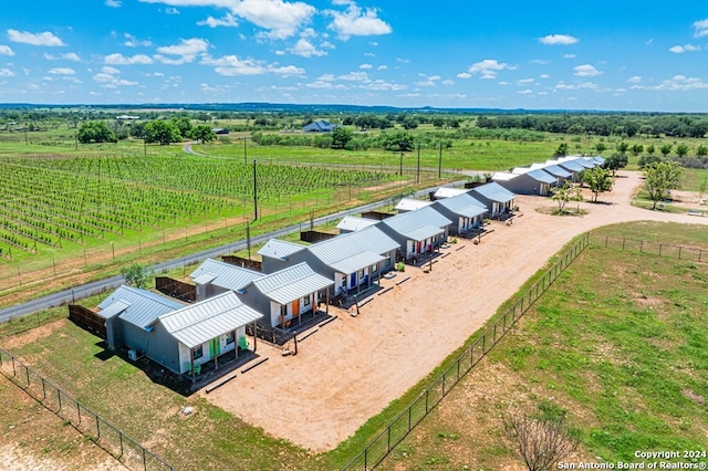 birds eye view of property featuring a rural view