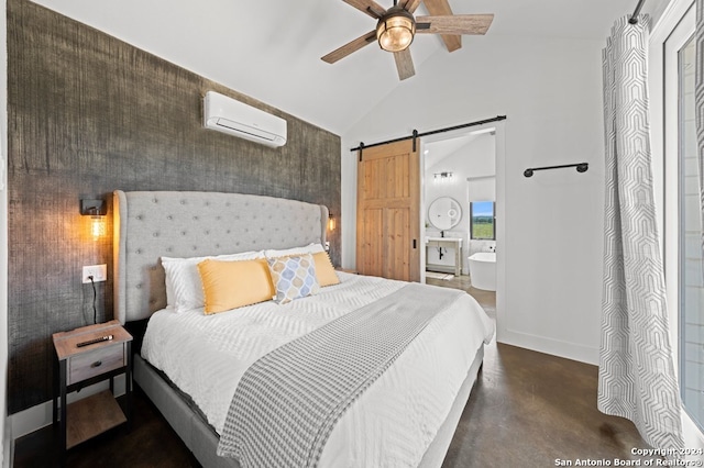 bedroom featuring lofted ceiling, ceiling fan, connected bathroom, a barn door, and a wall mounted AC