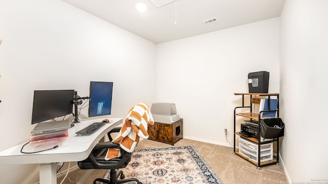 office area featuring light colored carpet