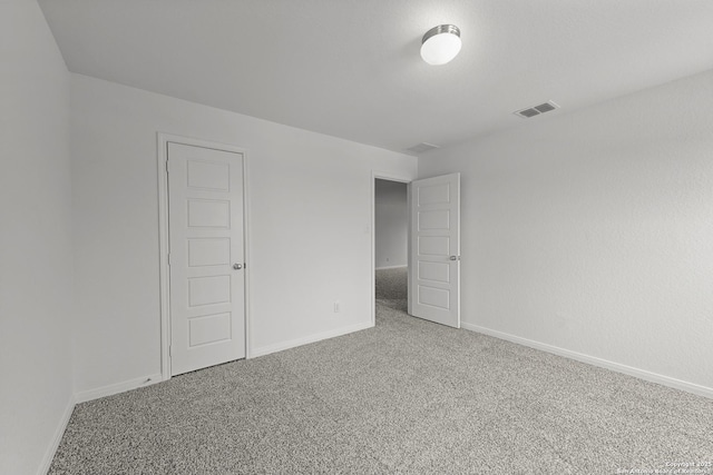 8432 Roadrunner Psge, San Antonio, TX 78222 - unfurnished bedroom with visible vents, carpet, and baseboards