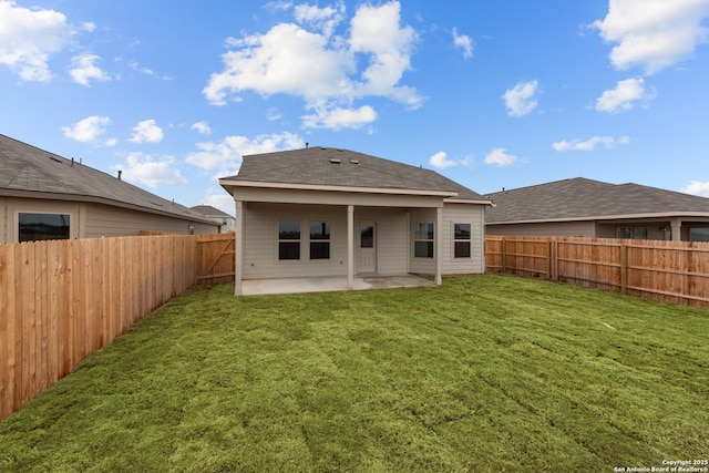 8432 Roadrunner Psge, San Antonio, TX 78222 - back of property with a patio area, a yard, and a fenced backyard