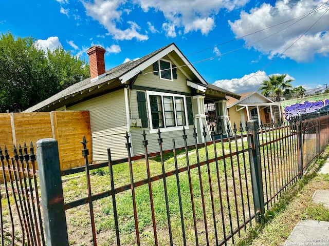 view of front of property with a front lawn