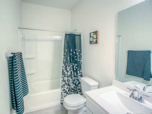 full bathroom with vanity, toilet, and shower / tub combo with curtain