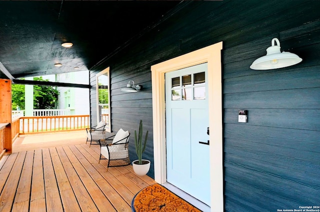 wooden terrace with covered porch