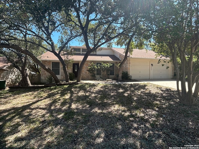 ranch-style home with a garage