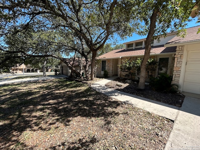 view of yard with a garage