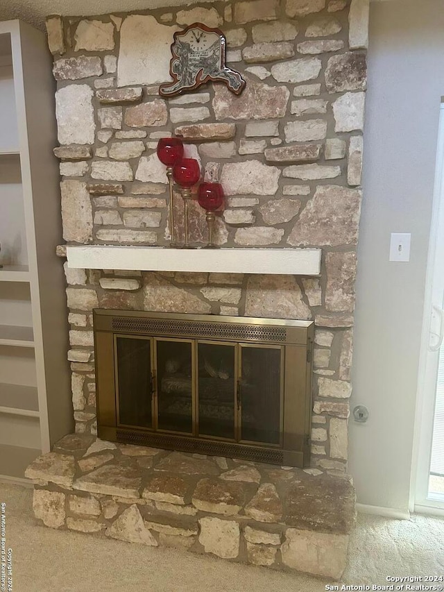 details with carpet floors and a fireplace