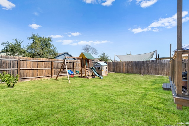 view of yard with a playground