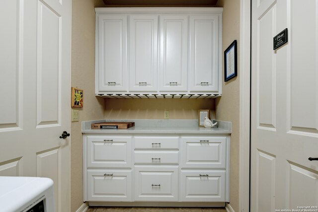 interior space featuring white cabinets