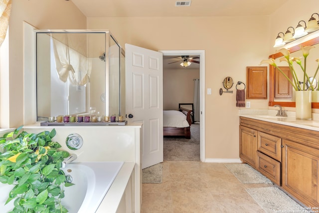 bathroom featuring vanity, separate shower and tub, tile patterned flooring, and ceiling fan