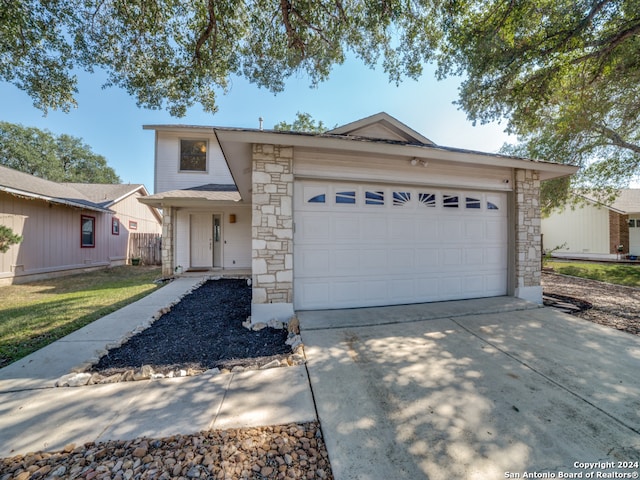 ranch-style home with a garage