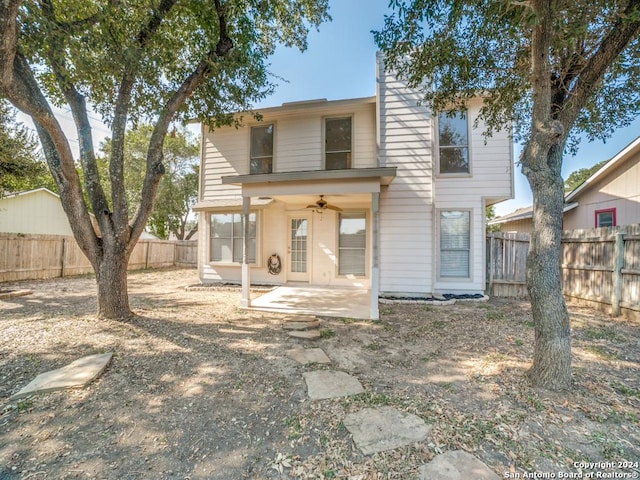 back of property featuring a patio area and ceiling fan