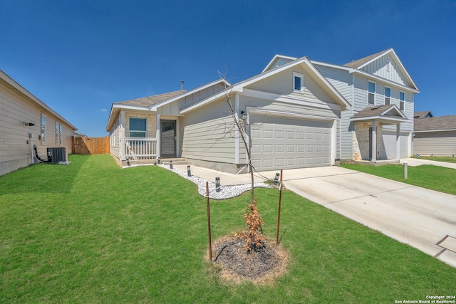 view of front of property with cooling unit and a front yard