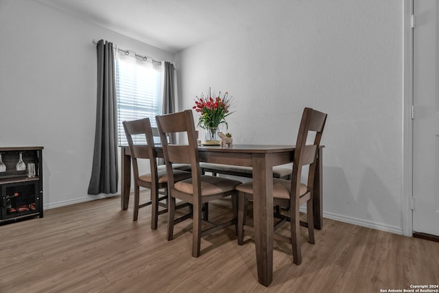 dining area with light hardwood / wood-style flooring