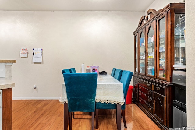 dining space featuring light wood-type flooring