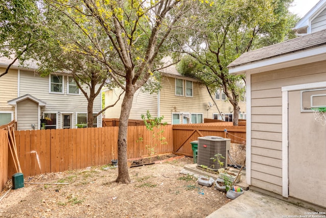 view of yard with central AC