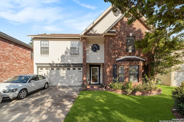 view of property with a front yard and a garage