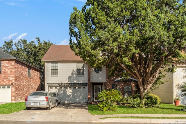 front of property with a garage