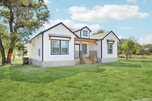 modern farmhouse style home featuring central AC and a front lawn