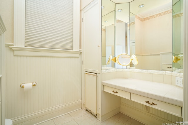 bathroom with vanity and tile patterned flooring