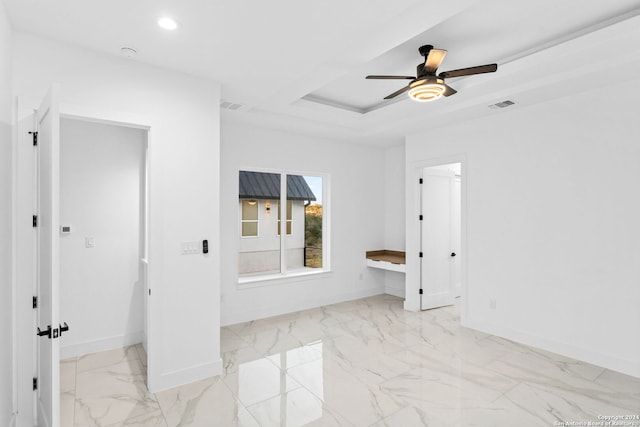 unfurnished room with ceiling fan