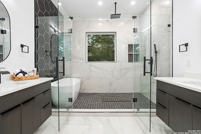 bathroom featuring vanity and plus walk in shower