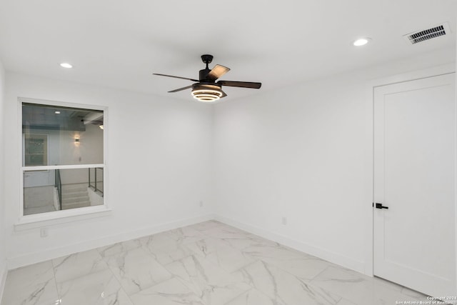 empty room featuring ceiling fan