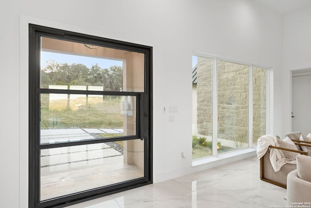 doorway to outside with plenty of natural light