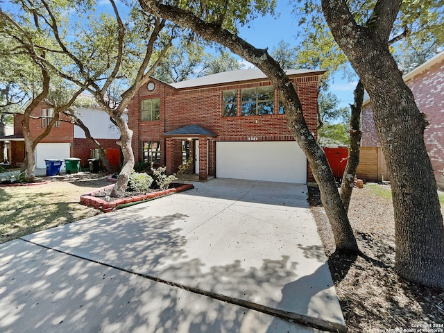 view of front of property with a garage