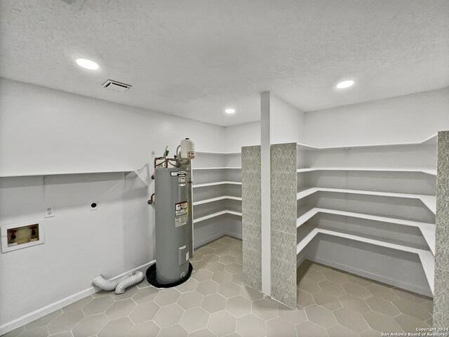 interior space featuring electric water heater