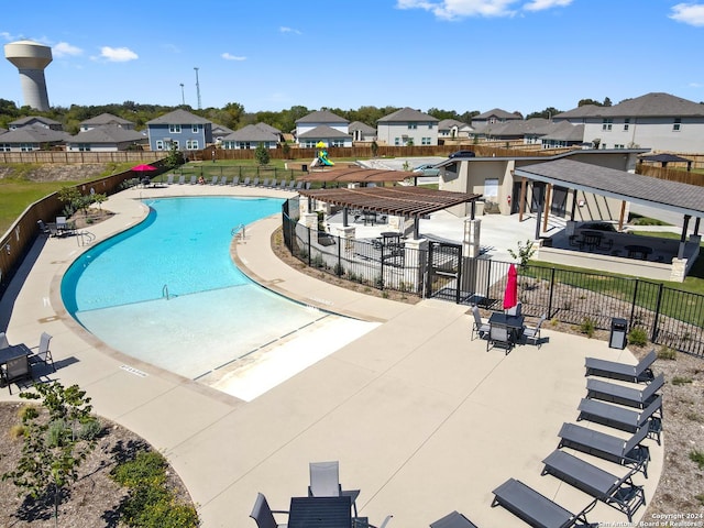 5433 Shasta Pl, Saint Hedwig, TX 78152 - community pool featuring a residential view, fence, and a patio area