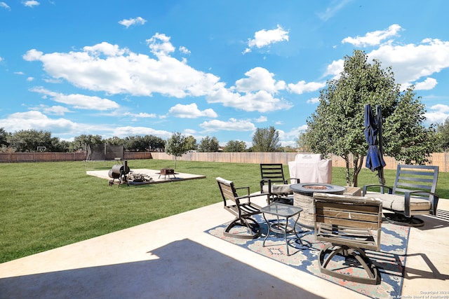 view of patio / terrace featuring an outdoor fire pit