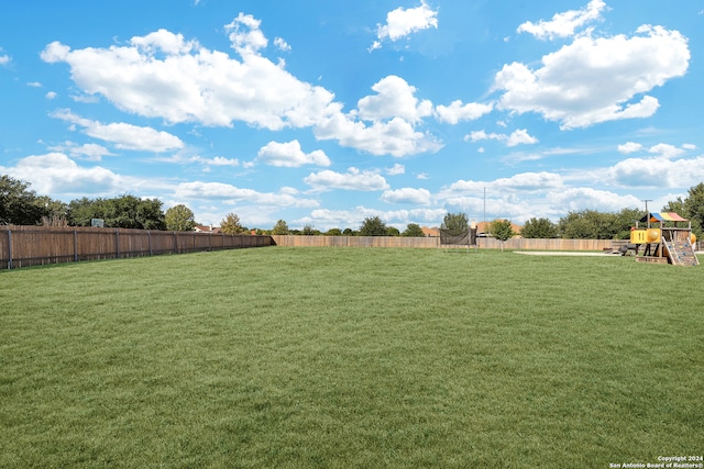 view of yard featuring a playground