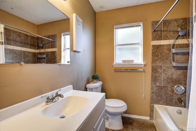 full bathroom featuring shower / tub combo with curtain, a textured ceiling, vanity, and toilet