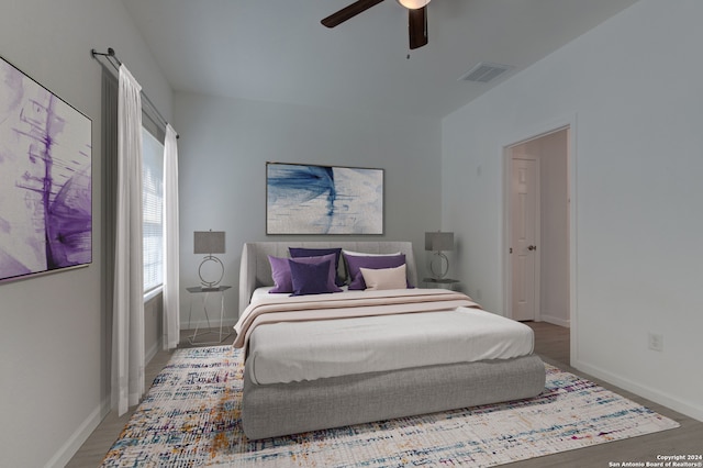 bedroom featuring ceiling fan and hardwood / wood-style floors