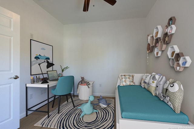 office with ceiling fan and hardwood / wood-style flooring