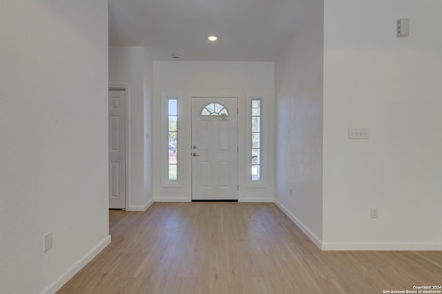 foyer with light hardwood / wood-style flooring