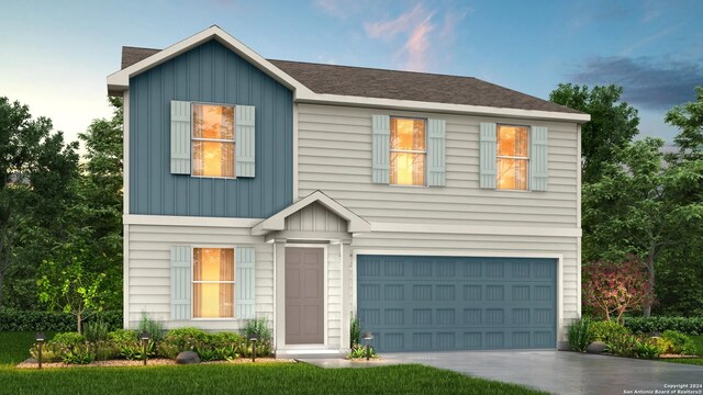 512 Jean St, Seguin, TX 78155 - view of front facade featuring board and batten siding, a garage, and concrete driveway