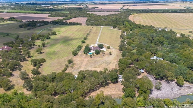 birds eye view of property featuring a rural view