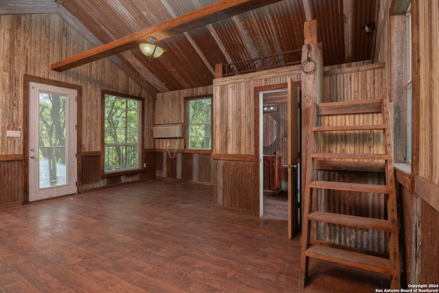 interior space featuring wood ceiling, wooden walls, vaulted ceiling with beams, and dark wood-type flooring