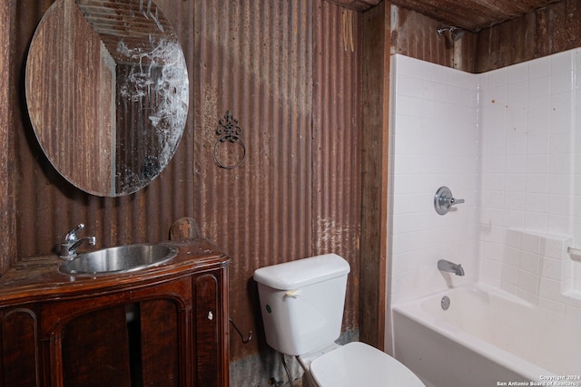 full bathroom with tub / shower combination, vanity, and toilet