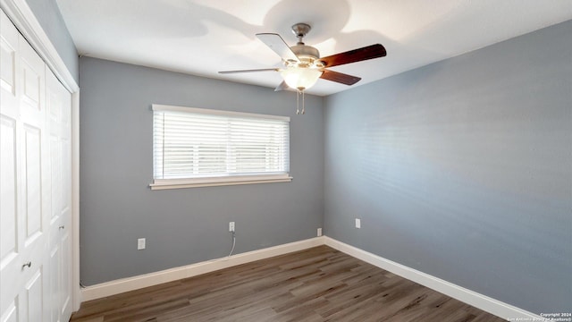 12743 S El Sonteo St, San Antonio, TX 78233 - unfurnished bedroom featuring a closet, wood finished floors, baseboards, and ceiling fan