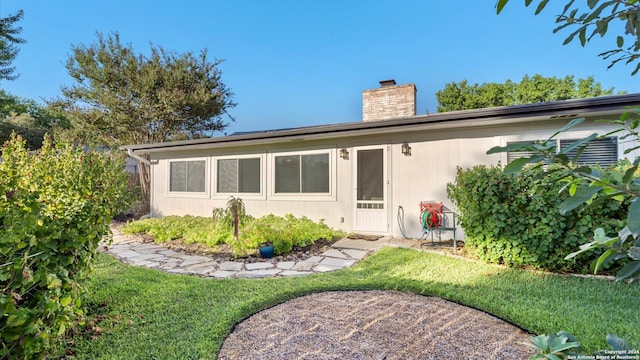 12743 S El Sonteo St, San Antonio, TX 78233 - back of property featuring a chimney