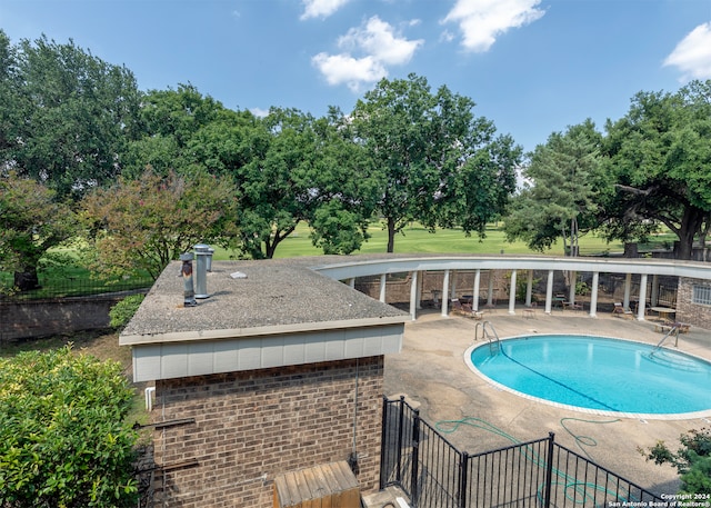 view of pool with a patio