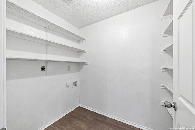 laundry room with washer hookup, electric dryer hookup, hookup for a gas dryer, dark hardwood / wood-style flooring, and a textured ceiling